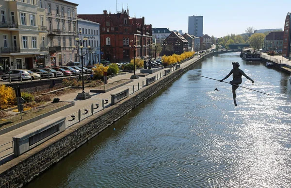 Tightrope Walker over the river - Bydgoszcz, Poland