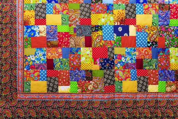 Hintergrund aus bunten Patchwork-Stoffen — Stockfoto