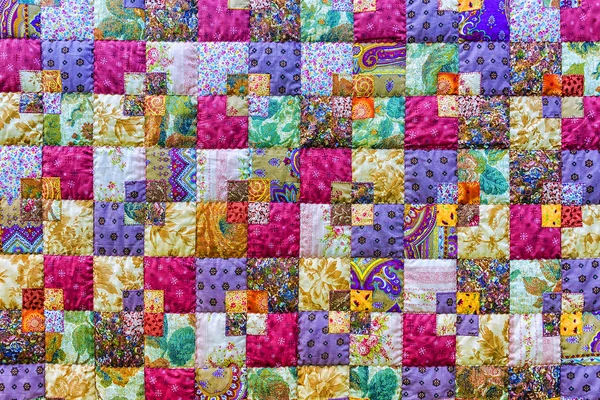 Hintergrund aus bunten Patchwork-Stoffen — Stockfoto