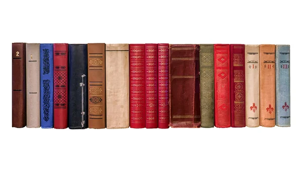 Buchrücken alter Bücher auf weißem Hintergrund — Stockfoto