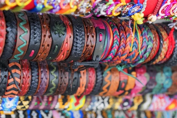 Ethnic background leather bracelets — Stock Photo, Image
