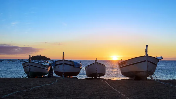 Fishing boats in the Mediterranean Sea on sunrise background — Stock Photo, Image