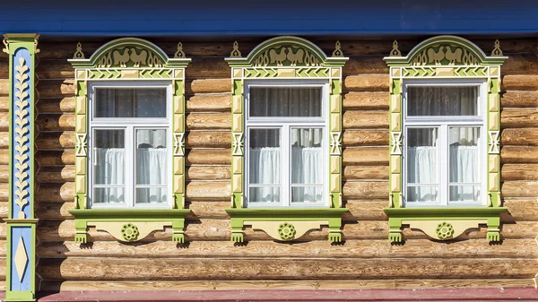 Facade of Russian log houses with frames — Stock Image Facade of Russian log houses with frames Stock Image