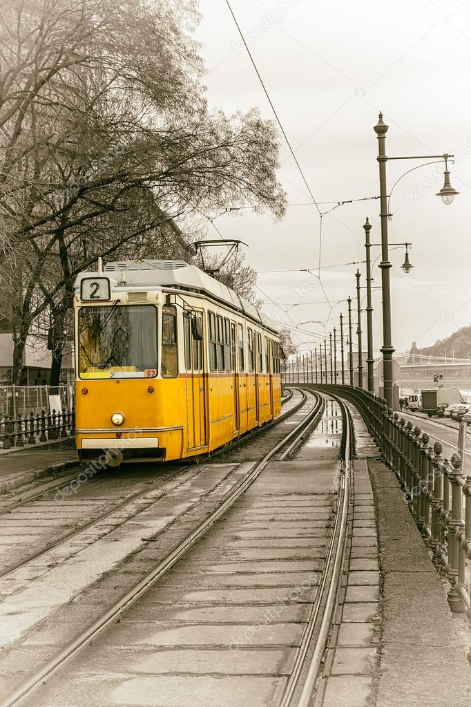 yellow tram on the embankment of Budapest