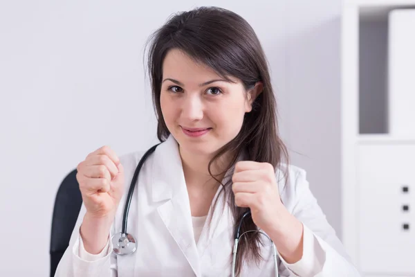 Holding thumbs for your health — Stock Photo, Image