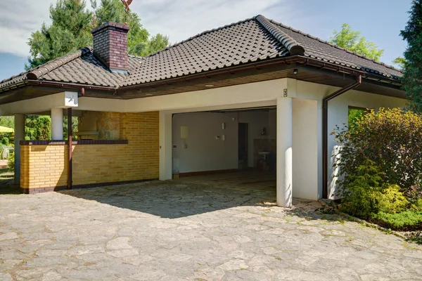 Beautiful stylish mansion with garage — Stock Photo, Image