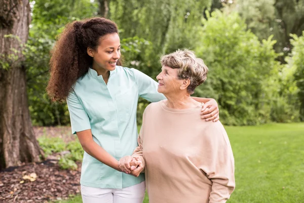 Walking around with elder — Stock Photo, Image