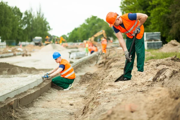 Die Bordsteinverlegung — Stockfoto