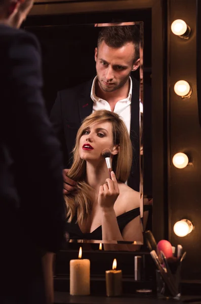 Sexy woman doing makeup — Stock Photo, Image