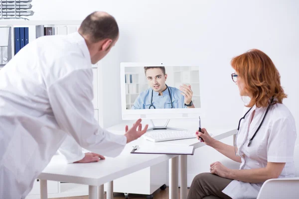 Video medical consultation via modern technology — Stock Photo, Image