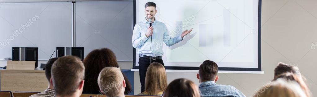Handsome professor during lecture