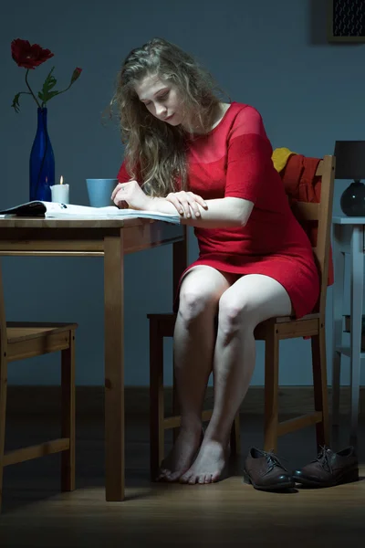 Lonely girl in red dress — Stock Photo, Image