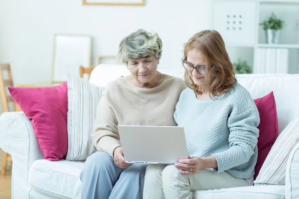 Elder lady and modern technology — Stock Photo, Image