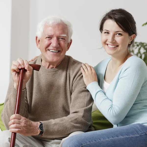 Granddaughter and her grandfather — Stock Photo, Image