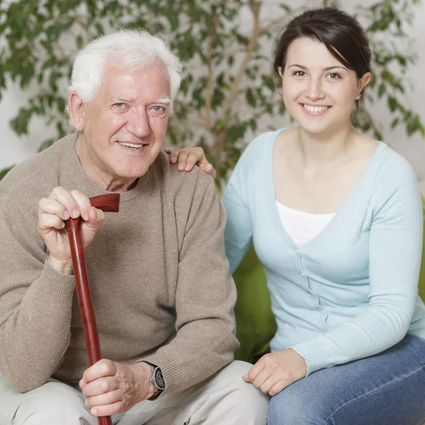 Granddaughter and her grandfather — Stock Photo, Image