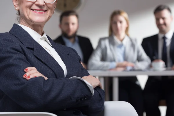 Confident older woman in suit and job interview — Stock Photo, Image