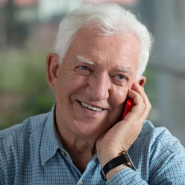 Lachende oudere man — Stockfoto