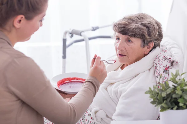 Rest home resident having care — Stock Photo, Image