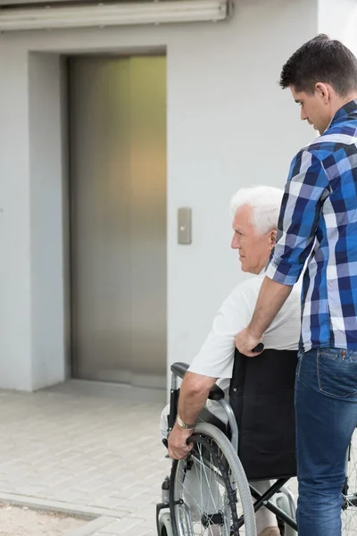 Man on wheelchair — Stock Photo, Image