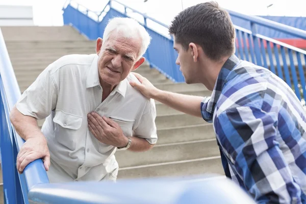 Strong chest pain — Stock Photo, Image