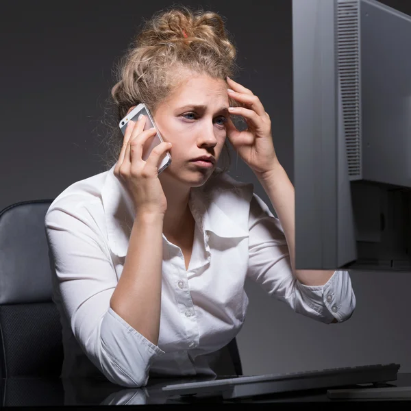 Tired office worker working overtime — Stock Photo, Image
