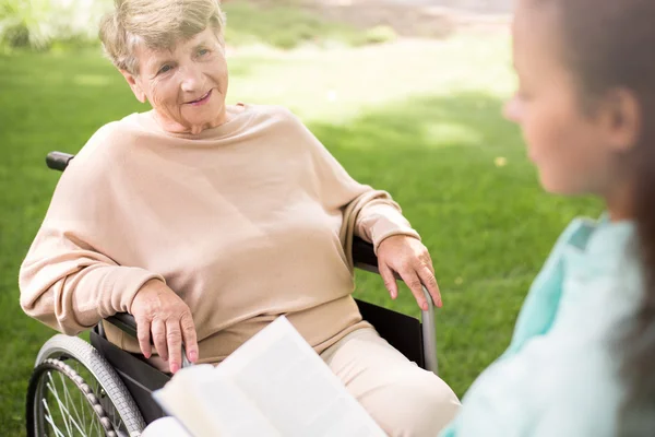 Woman on wheelchair — Stock Photo, Image