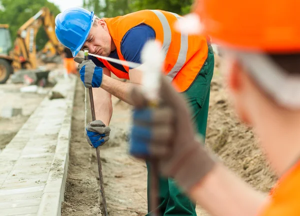 Teamwork på byggarbetsplats — Stockfoto