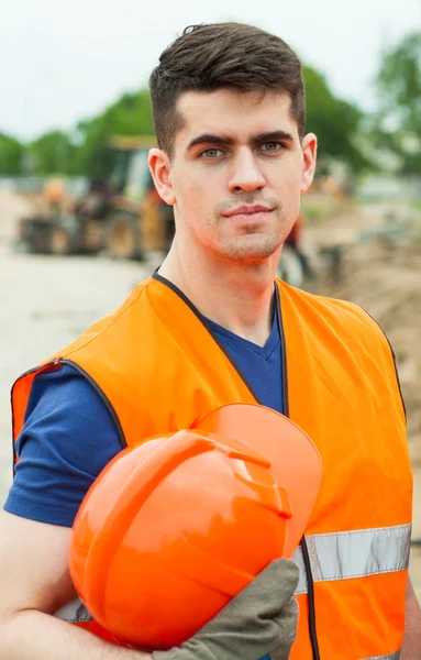 Construtor bonito com chapéu duro — Fotografia de Stock