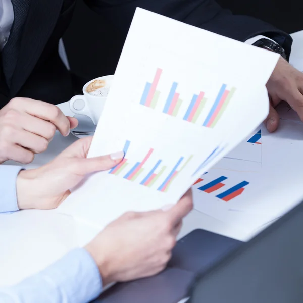 Female hands holding paper — Stock Photo, Image