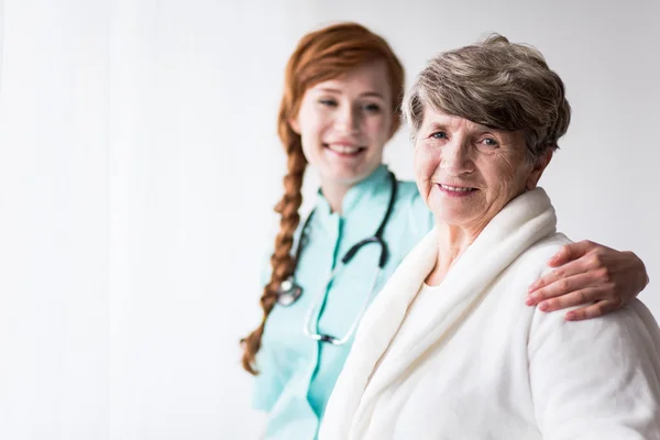 Helpful doctor and content patient — Stock Photo, Image