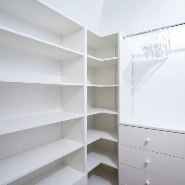 Interior of empty wardrobe with white furniture — Stock Photo, Image