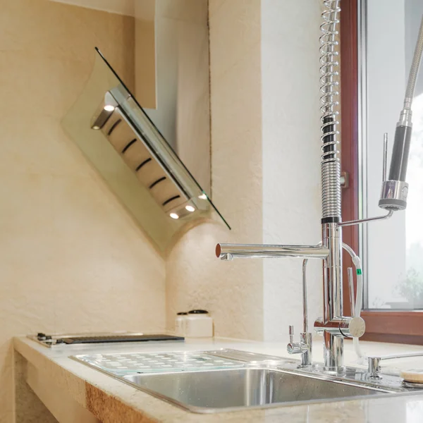 Close up of solid kitchen sink and worktop — Stock Photo, Image