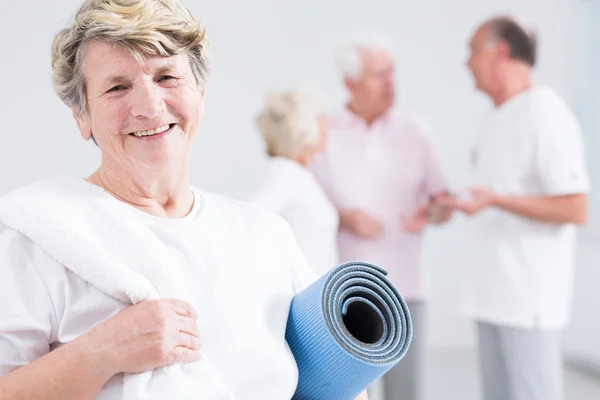 Tired but happy after fitness session at senior club — Stock Photo, Image