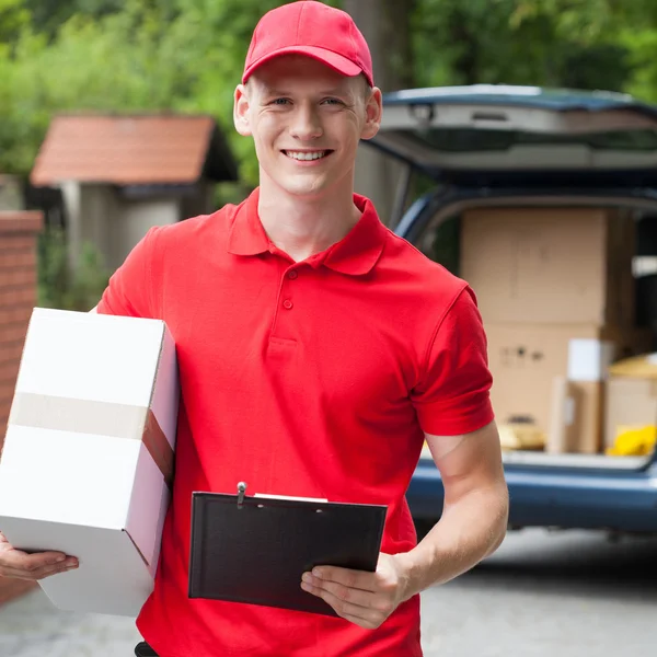 Happy delivery man — Stock Photo, Image