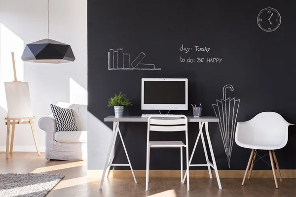 Small workspace with blackboard wall at home — Stock Photo, Image