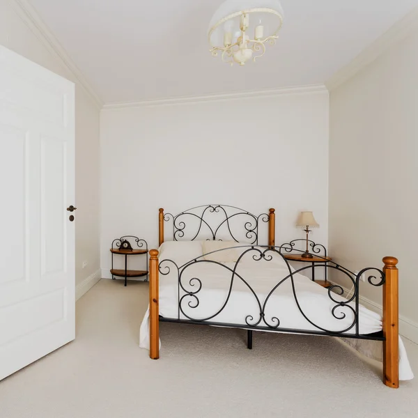 Simple bedroom and wooden stairs — Stock Photo, Image