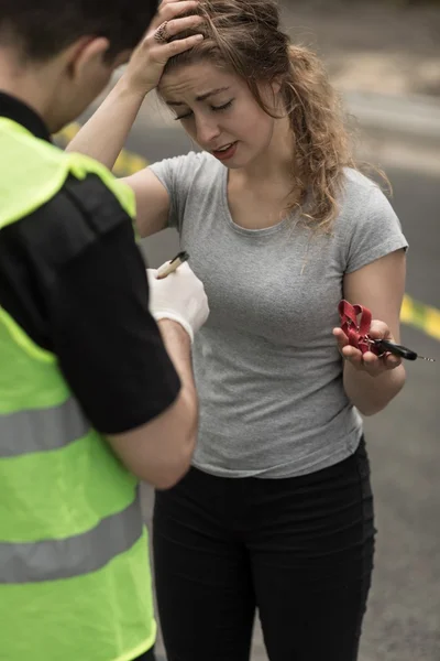 Female participant of motor collision — Stock Photo, Image