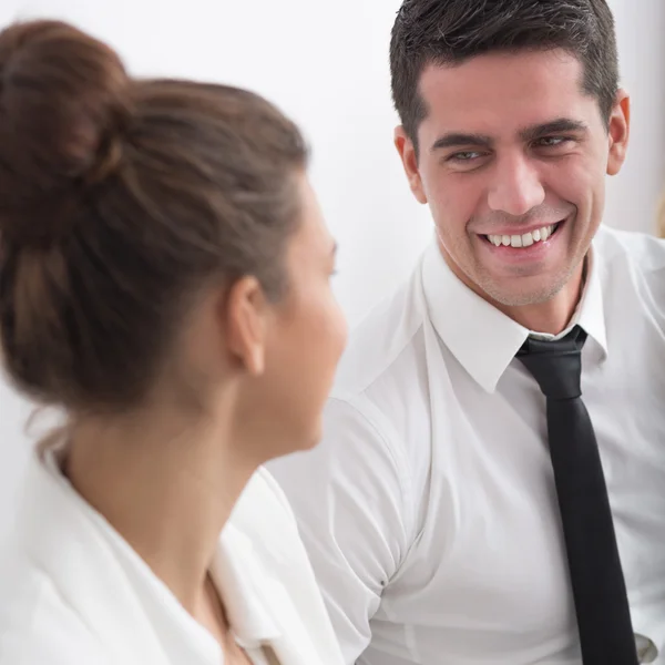 Businessman flirting with young woman — Stock Photo, Image