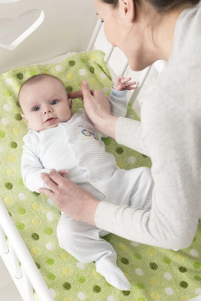 Mother waking up her baby — Stock Photo, Image