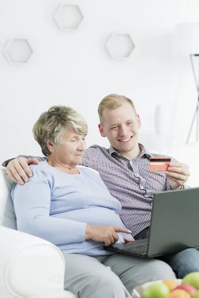 Online shopping with a grandson — Stock Photo, Image