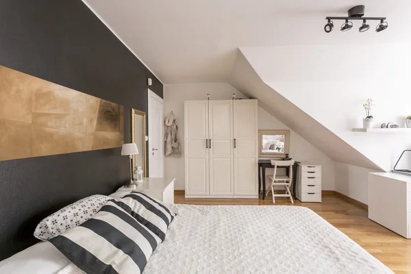 Attic bedroom in black and white — Stock Photo, Image