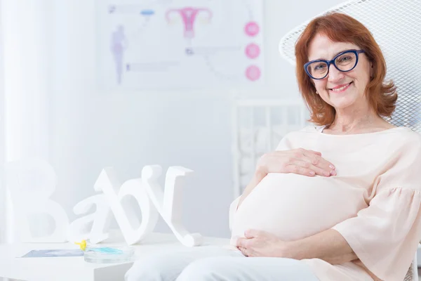 Older woman and in vitro baby — Stock Photo, Image