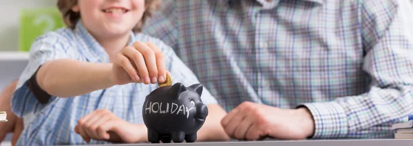 Saving money at young age — Stock Photo, Image