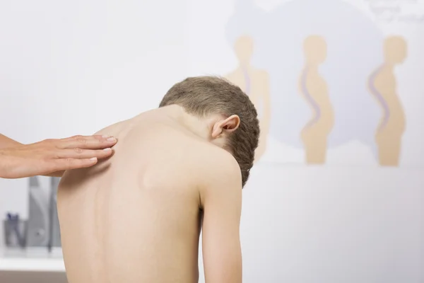 Check for the curvature of the spine — Stock Image Check for the curvature of the spine Stock Picture