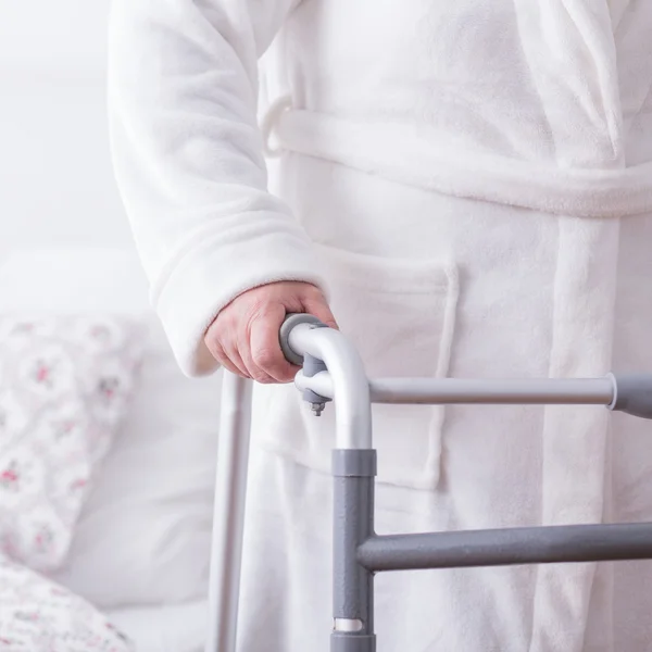 Woman with walker — Stock Photo, Image
