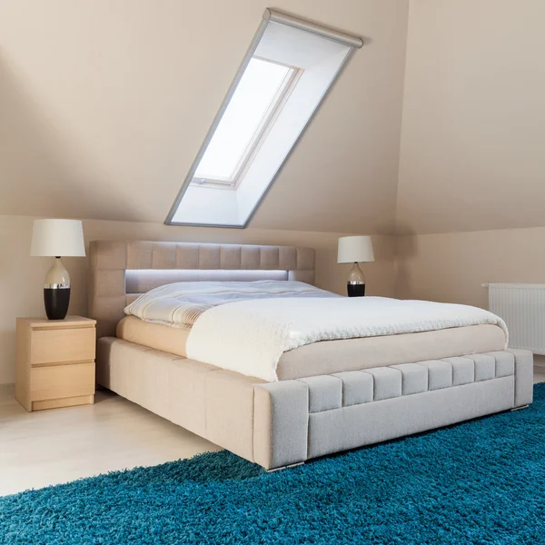 Bedroom arranged in the attic — Stock Photo, Image