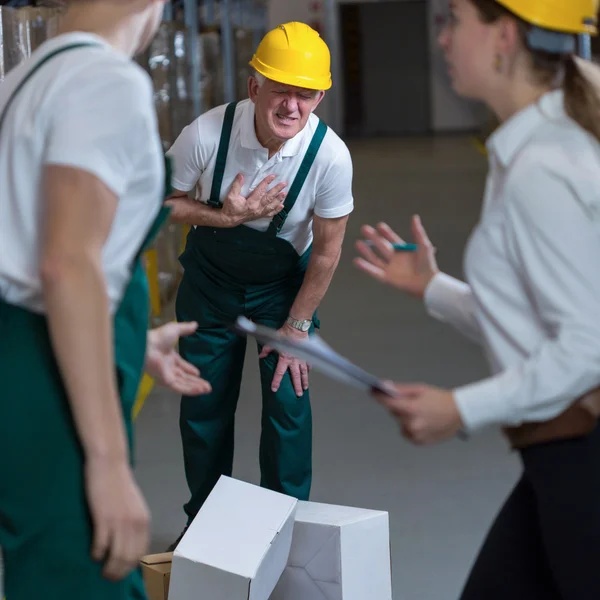 Senior in warehouse — Stock Photo, Image