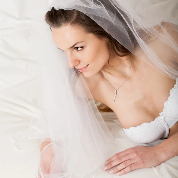 Woman in underwear in a bed — Stock Photo, Image