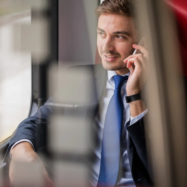 Talking on the phone during way to work — Stock Photo, Image