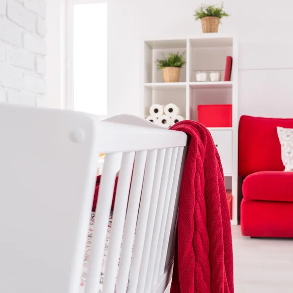 Red and white beautifully combined in a baby room — Stock Photo, Image